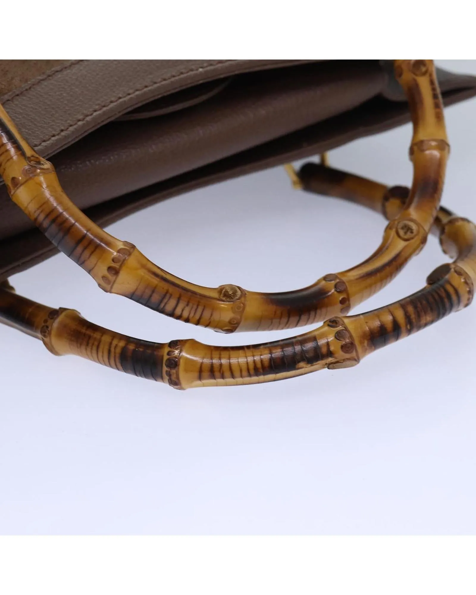 Bamboo Handle Suede Handbag with Gold Accents