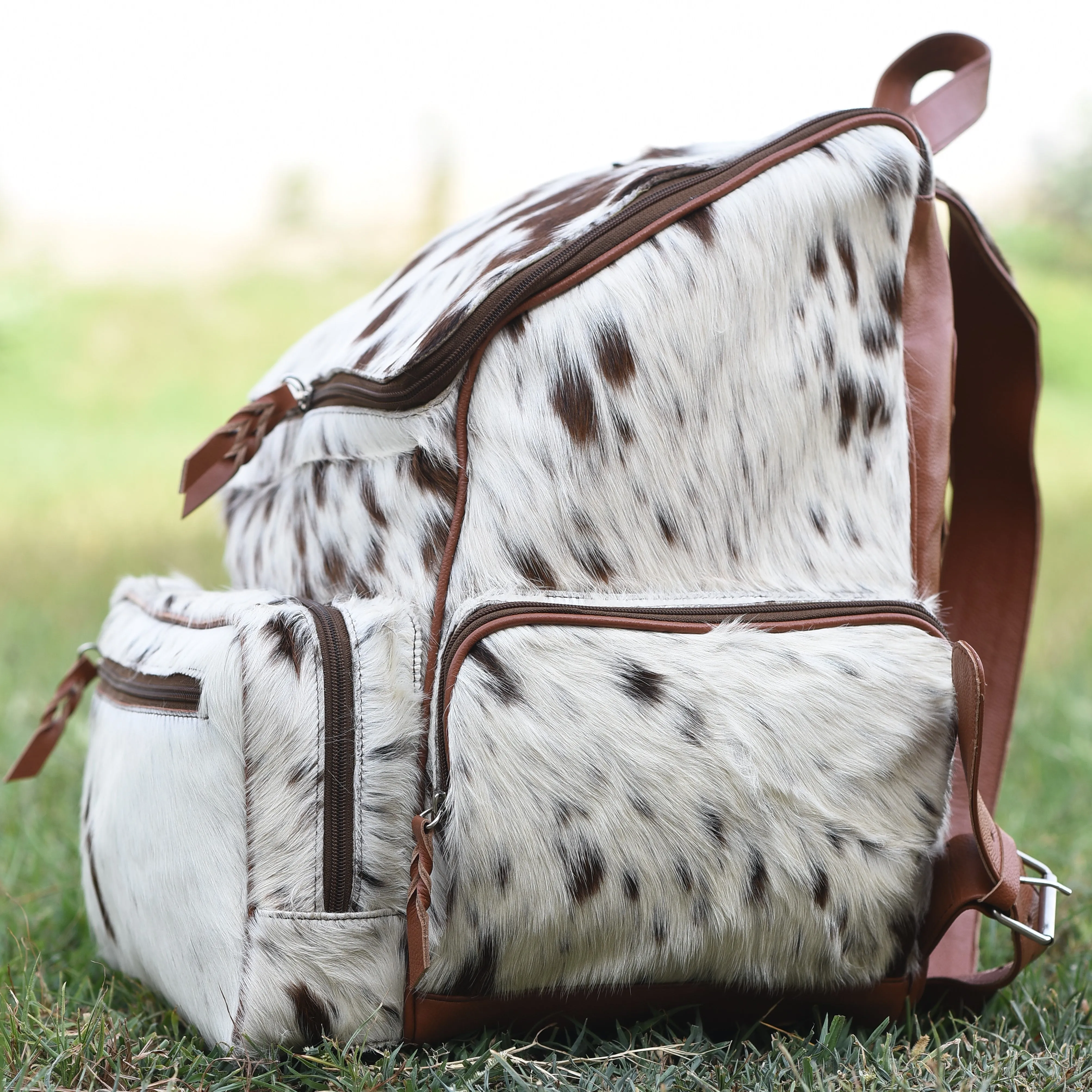 Large Cowhide Diaper Backpack: Luxury for Everyday Use" 1006