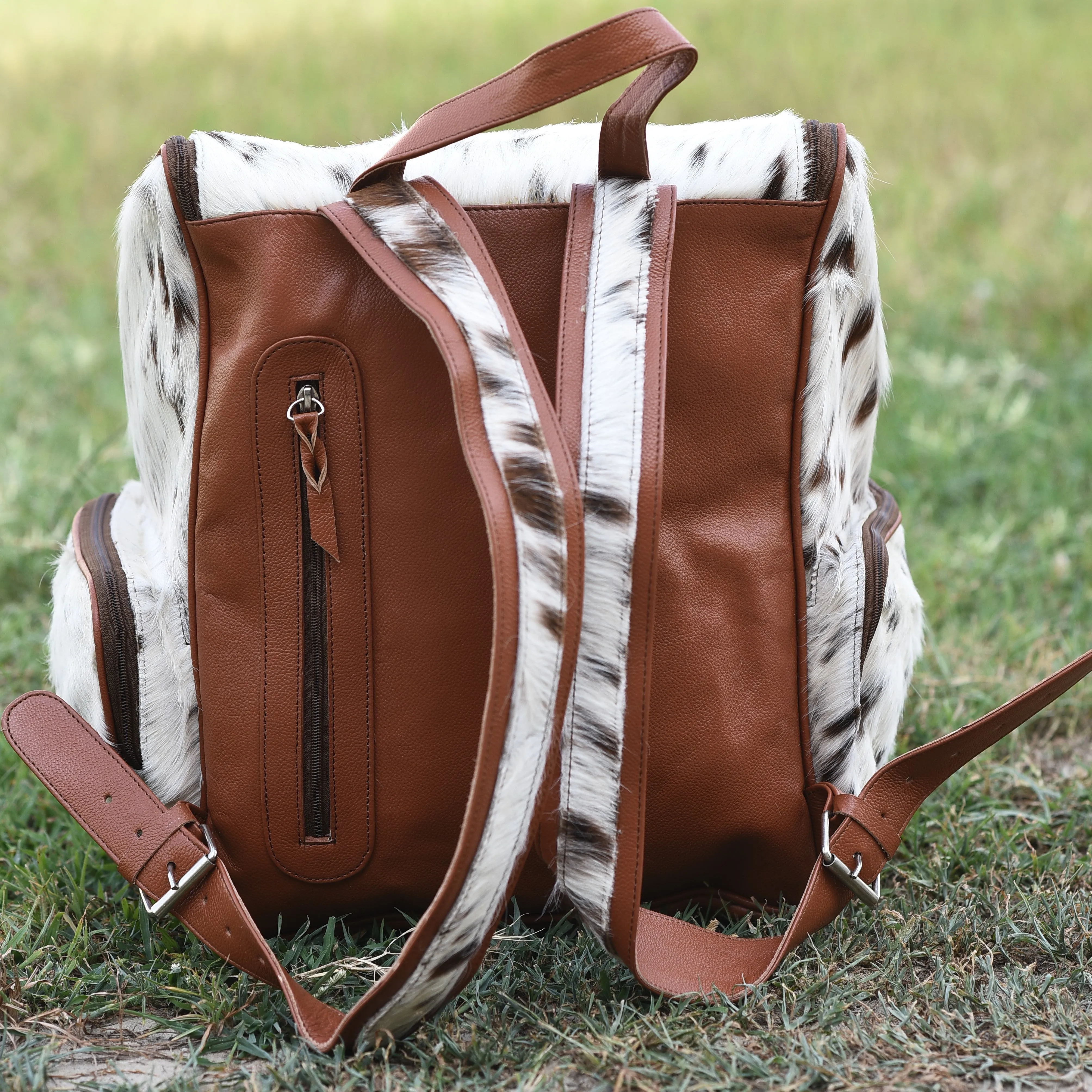 Large Cowhide Diaper Backpack: Luxury for Everyday Use" 1006